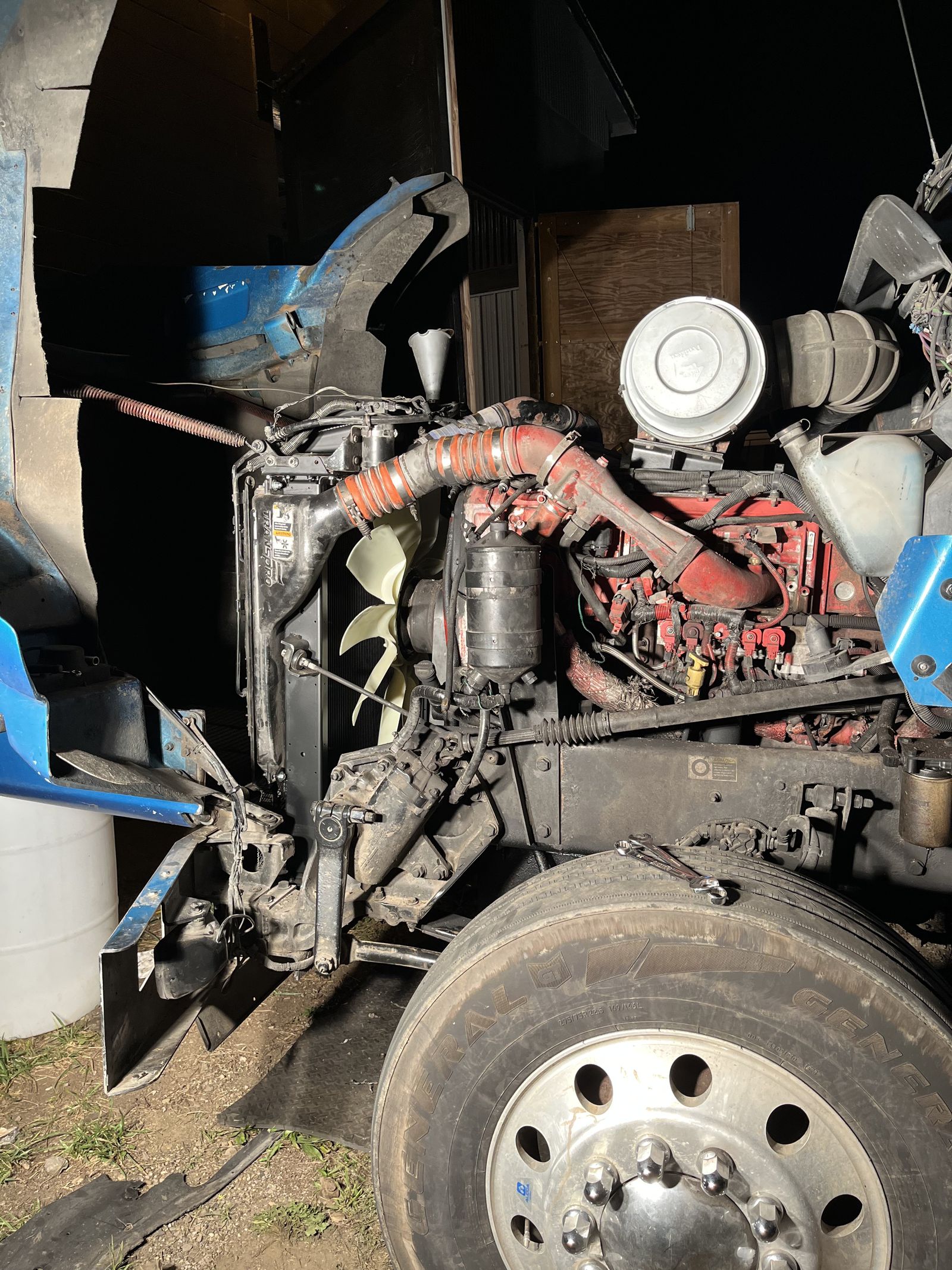 Diesel engine repair with hood open
