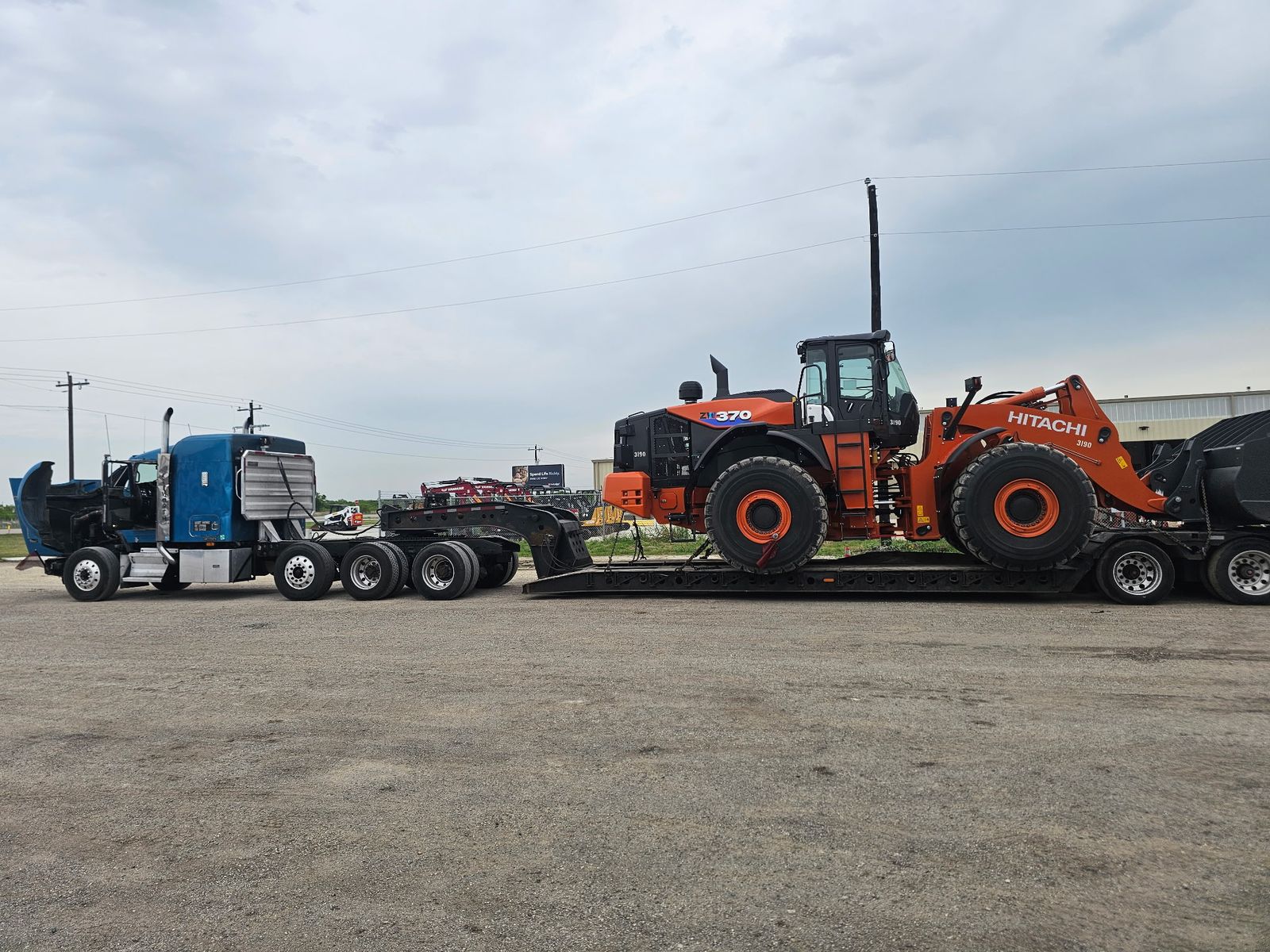 Hitachi wheel loader on lowboy
